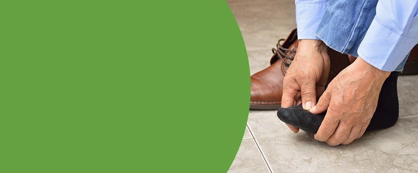 Man massaging foot