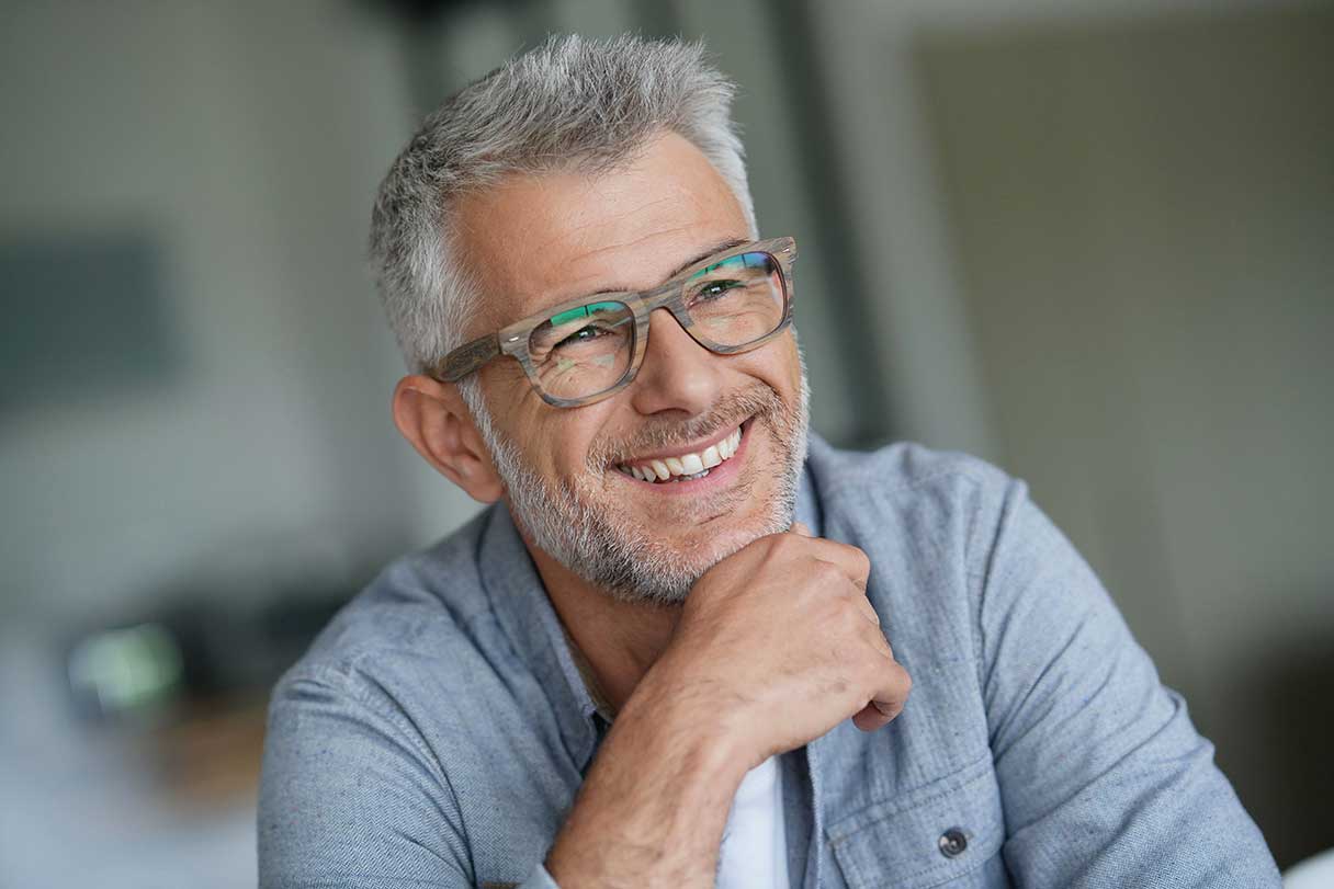 Man in glasses, smiling