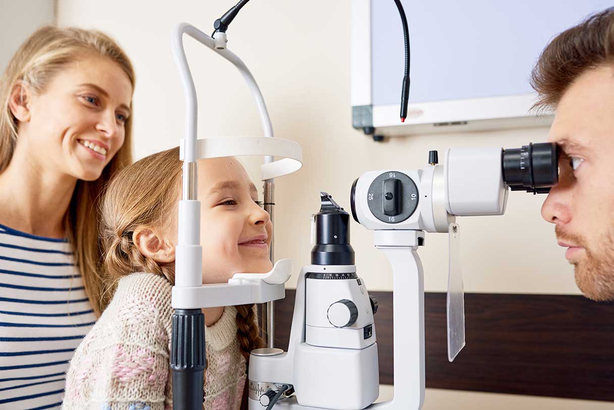 Young girl receiving an eye exam