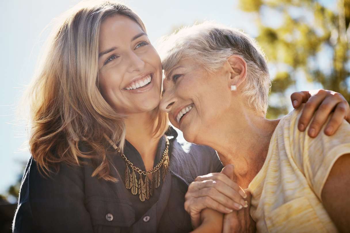 Two women laughing together