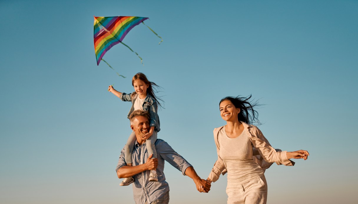 Family flying a kite together