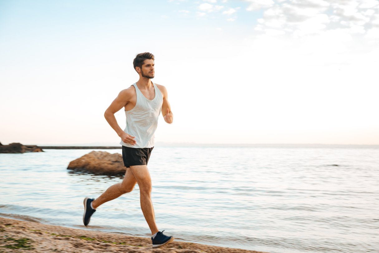 Man running on a beach