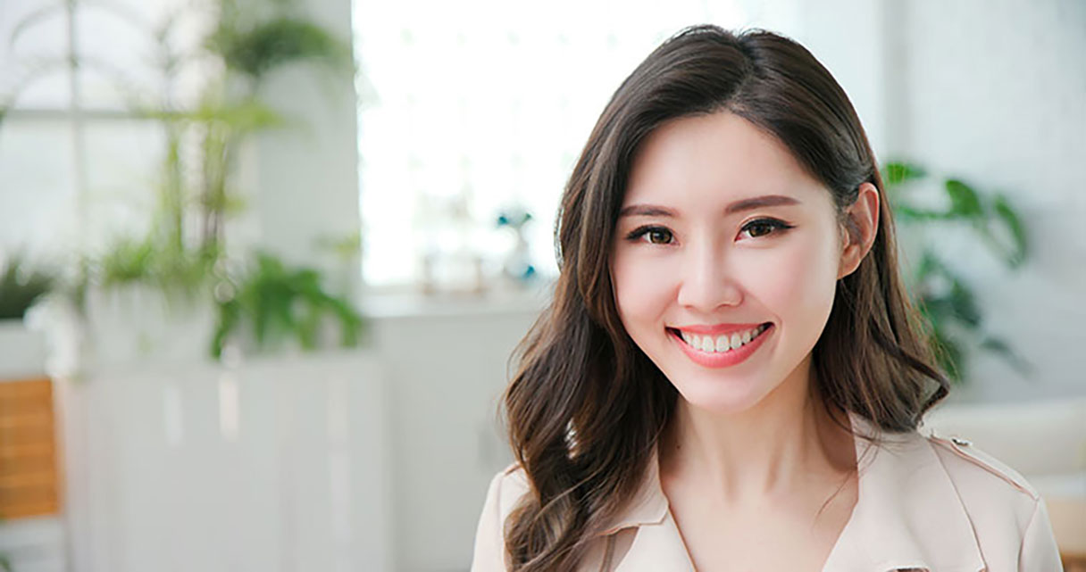 Close-up of a woman smiling