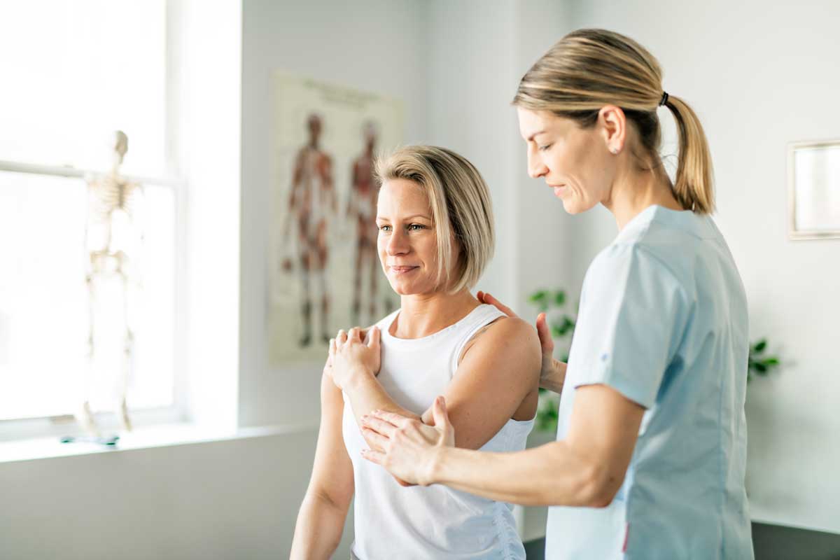 Woman receiving chiropractic adjustment