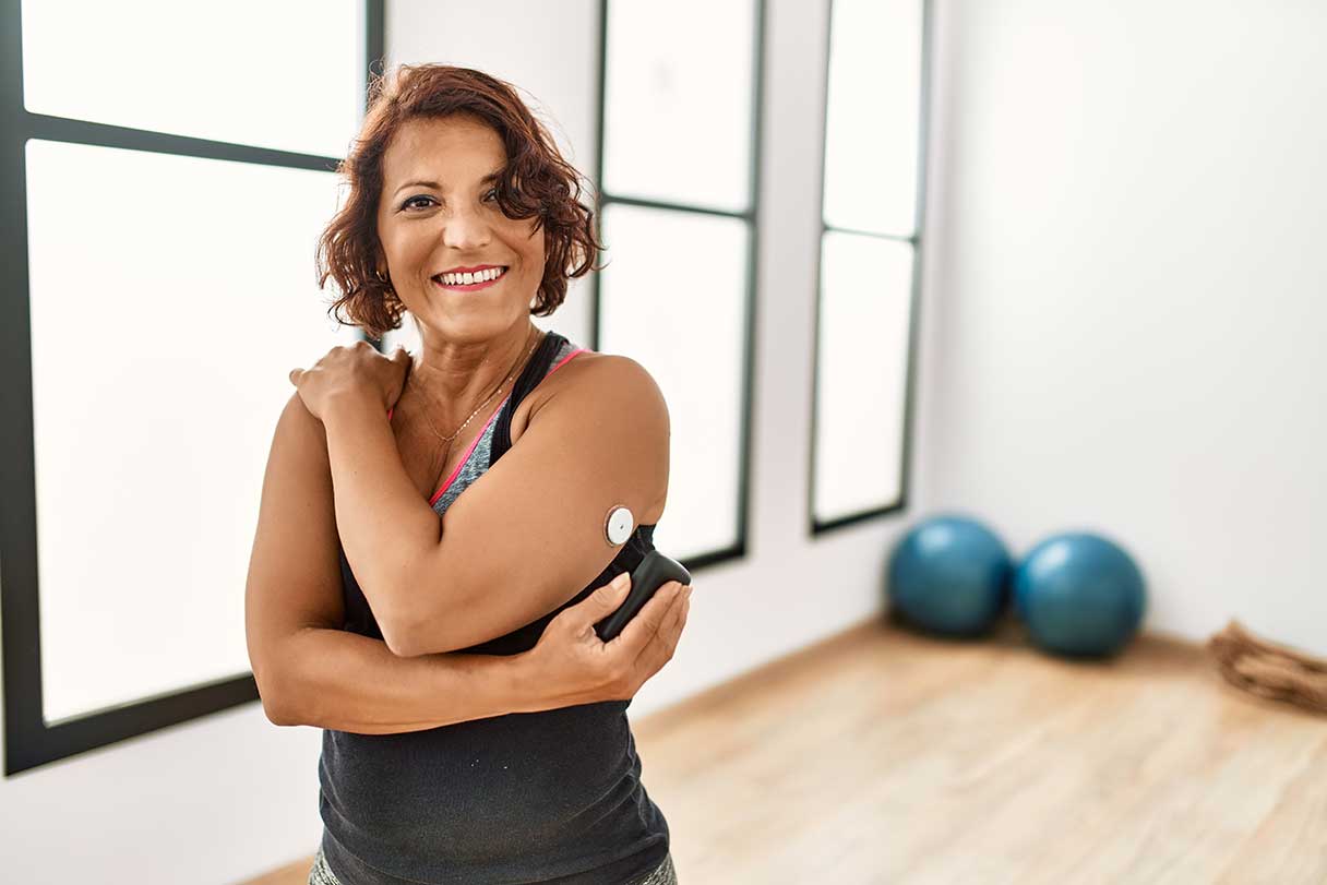 Woman stretching in a fitness room