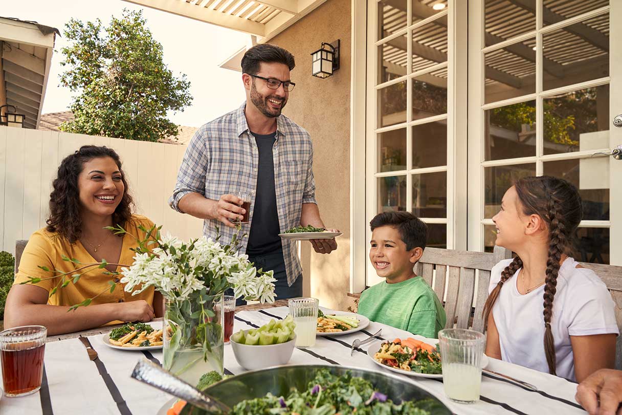 Family enjoying a meal outside