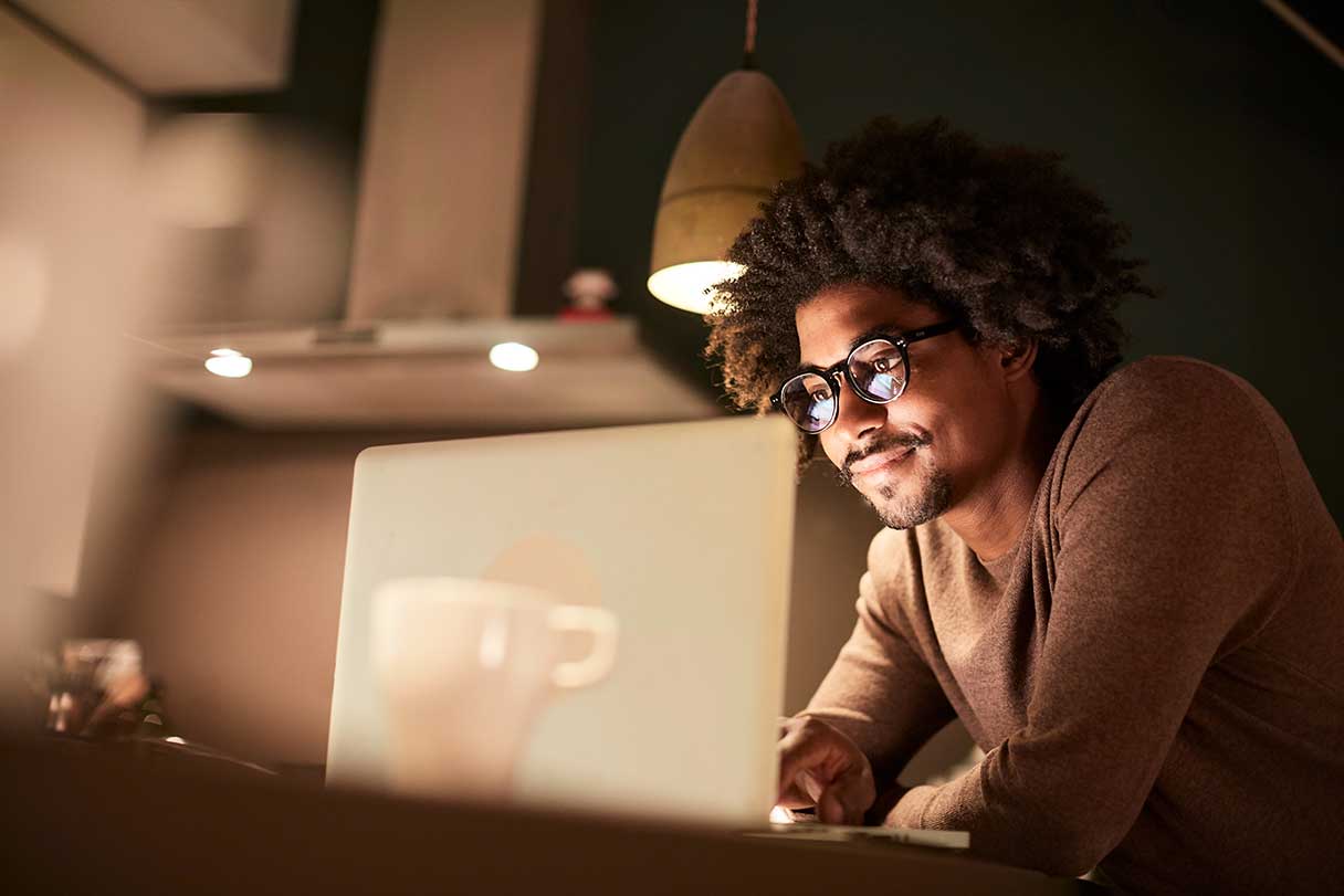 Man sitting at laptop