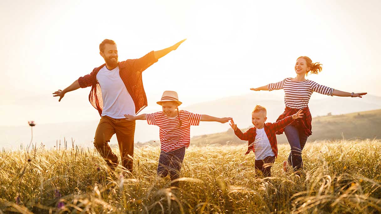 Family playing outside together