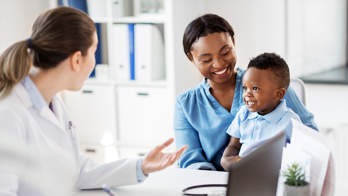 Mother and child with doctor