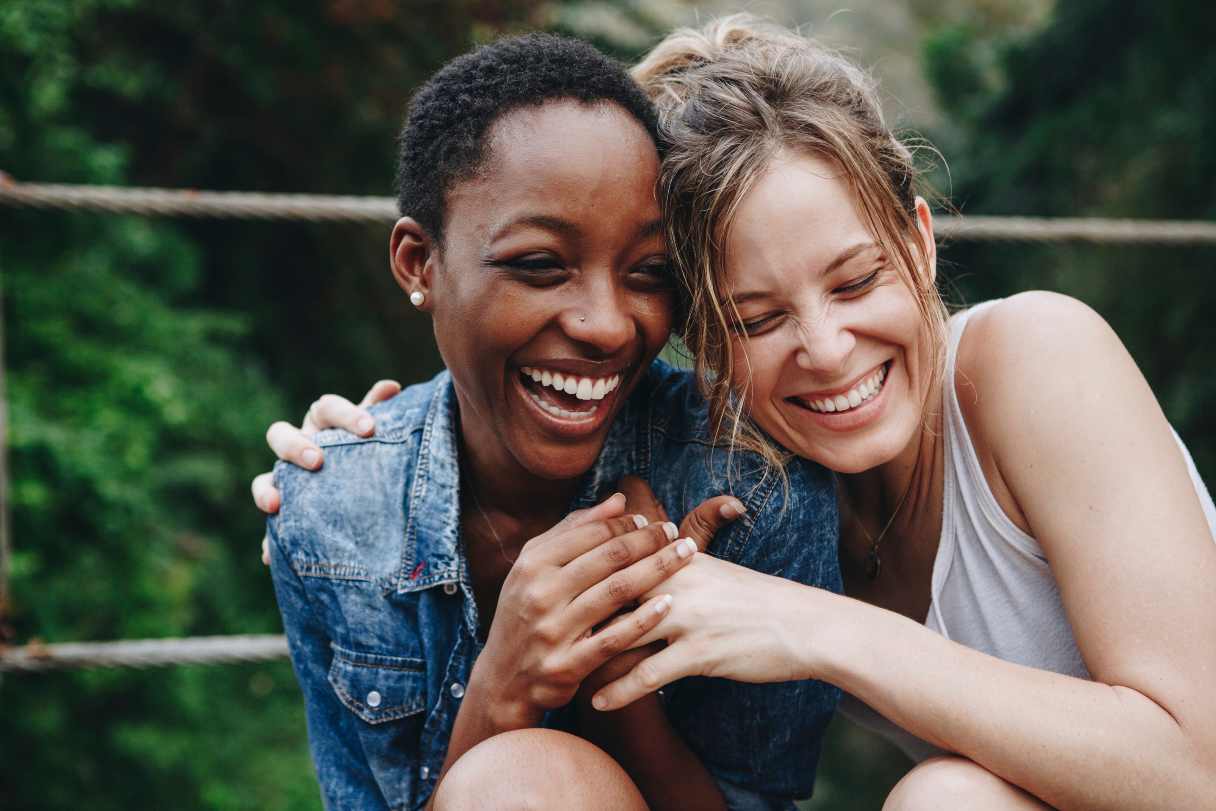 Two women smiling