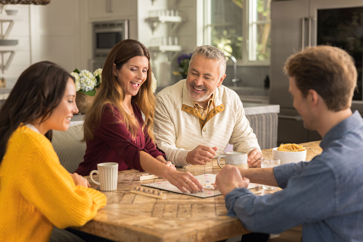 Family playing board game