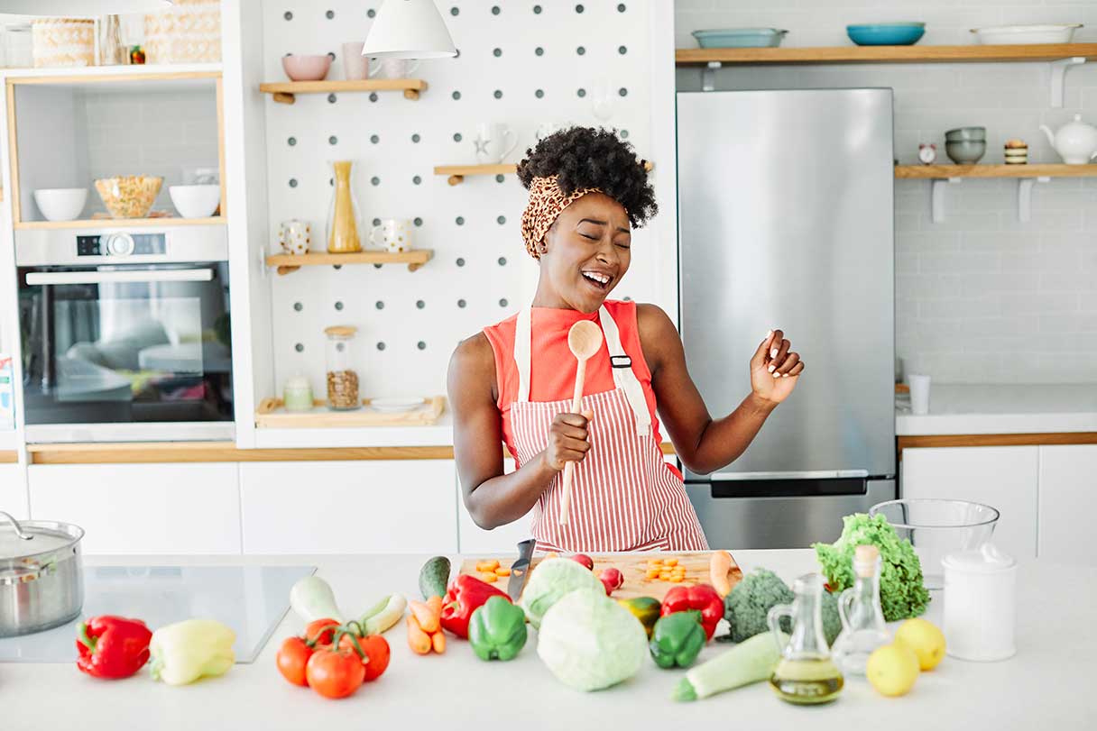 Woman preparing meal in kitchen