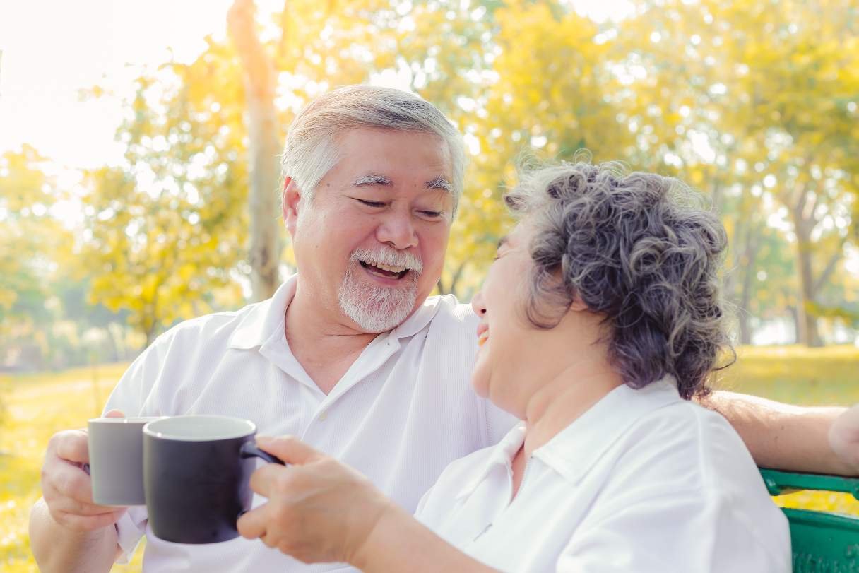 Senior couple laughing with each other