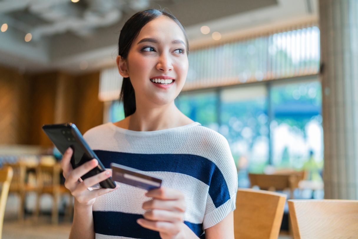 Woman holding mobile phone