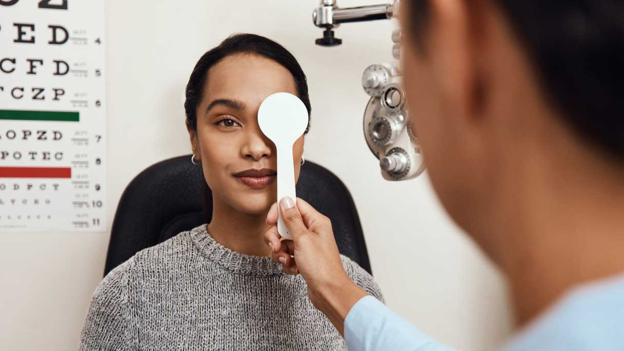 Woman receiving an eye exam