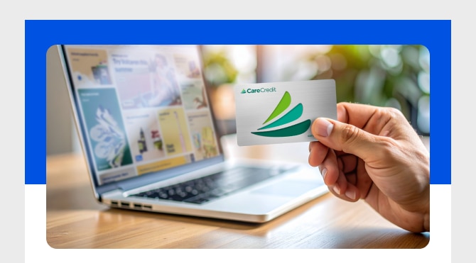 Person using CareCredit credit card on Walmart.com