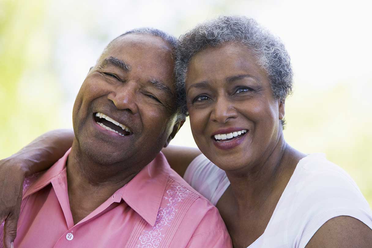 Senior man and woman together, smiling