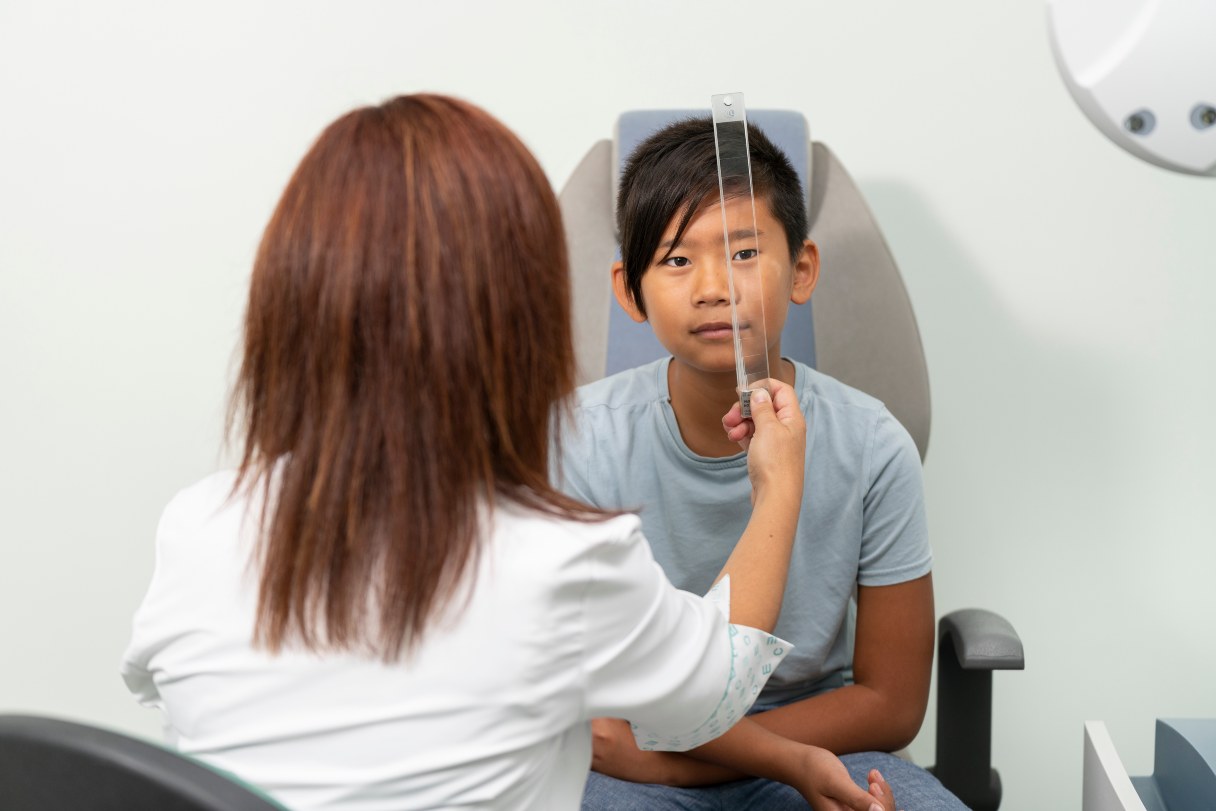 Child receiving eye exam